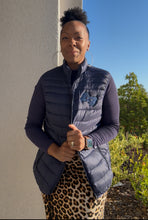 Load image into Gallery viewer, Packable Midweight Puffer Vest with Embroidered Interpreter Symbol
